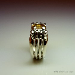 Ring in Argentium and Citrine. Title: "Gold Reflection", Arts and Crafts Jeweler. Lost wax in direct carving