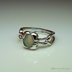 Ring in Argentium and Australian opal. Title: "Extraterrestrial life", Arts and Crafts Jeweler. Lost wax in direct carving