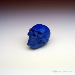 "Memento Mori" Carved Lapis Lazuli skull. Left perspective view